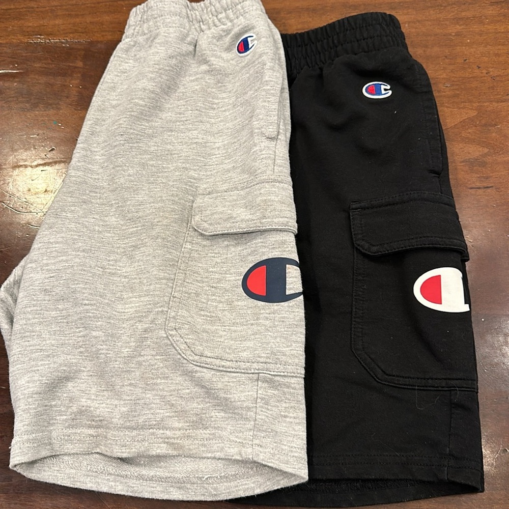 2 pairs of Champion shorts both Youth Medium